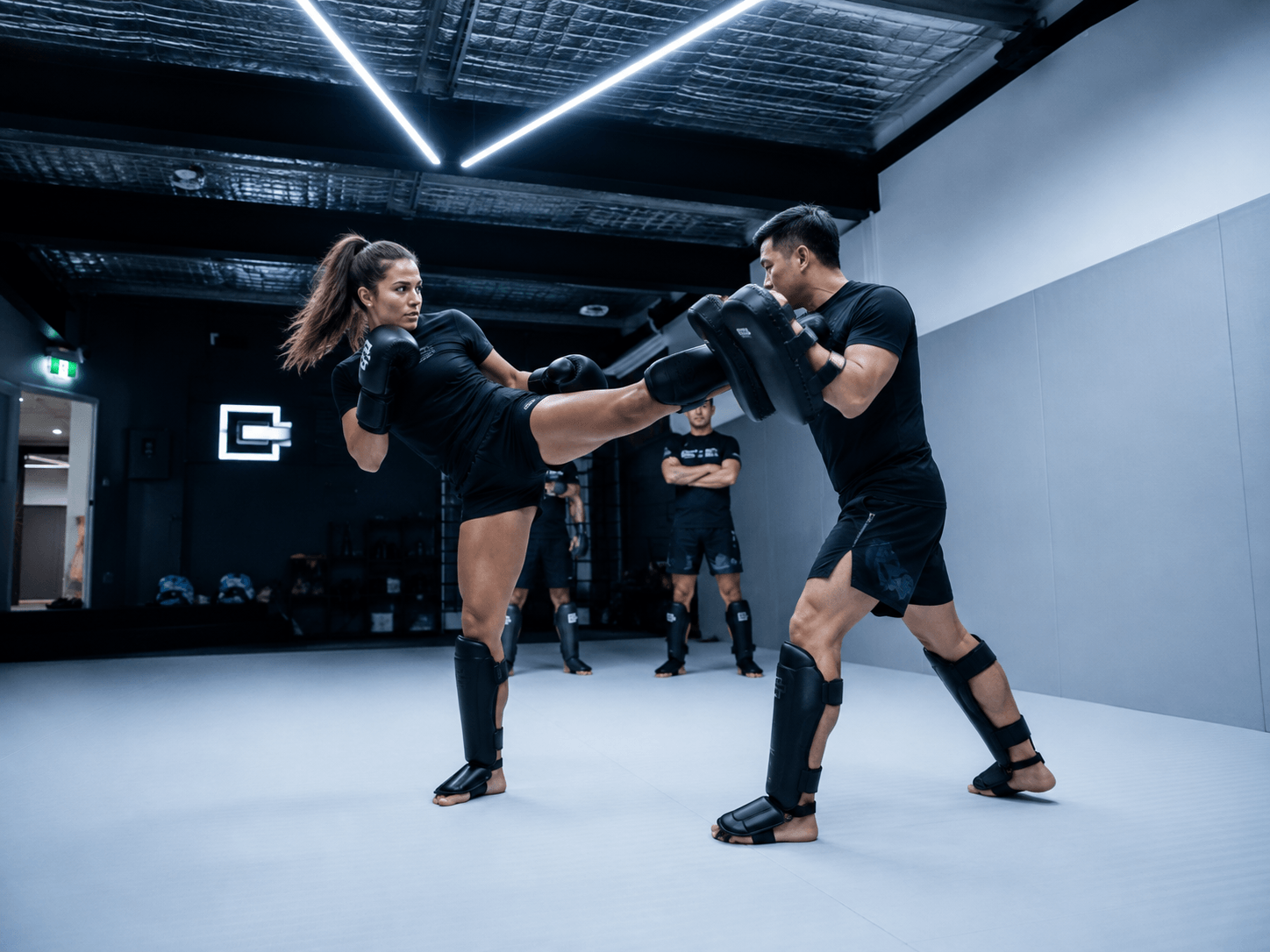 Bright kickboxing action shot at Chess Club Martial Arts